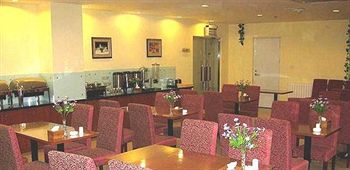 Imagen del bar/restaurante del Hotel Hanting Inn Exhibition Center - Changchun. Foto 3