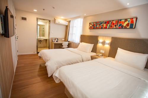 Imagen de la habitación del Hotel Hanting Kunming Railway Station Branch. Foto 1