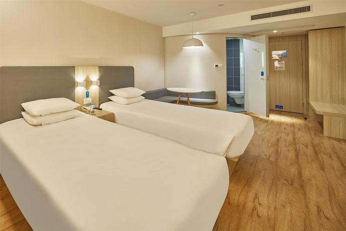 Imagen de la habitación del Hotel Hanting Kunshan Mingzhu Jicheng. Foto 8