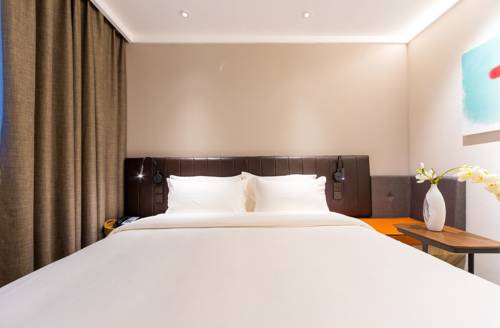 Imagen de la habitación del Hotel Hanting Premium Shanghai Dapu Bridge Riyuegu. Foto 2