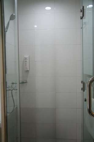 Imagen de la habitación del Hotel Hanting Qingdao May Fourth Square. Foto 4