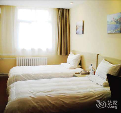 Imagen de la habitación del Hotel Hanting Qingdao May Fourth Square. Foto 10