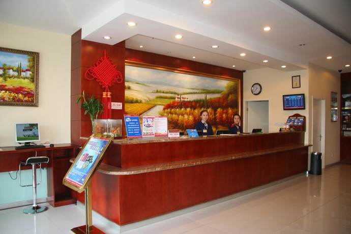 Imagen de los interiores del Hotel Hanting Qingdao May Fourth Square. Foto 18