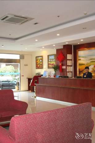 Imagen de la habitación del Hotel Hanting Qingdao May Fourth Square. Foto 13