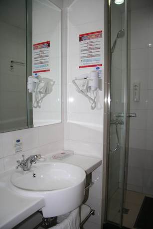 Imagen de la habitación del Hotel Hanting Qingdao May Fourth Square. Foto 16