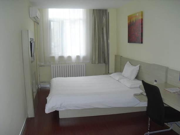Imagen de los interiores del Hotel Hanting Qingdao May Fourth Square. Foto 20