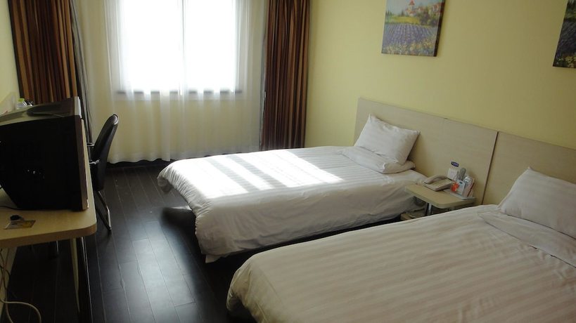 Imagen de la habitación del Hotel Hanting Shanghai Zhongshan West Road. Foto 3