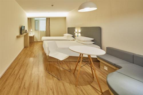 Imagen de la habitación del Hotel Hanting Tianjin Railway Station. Foto 6