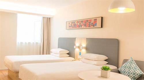 Imagen de la habitación del Hotel Hanting Wuxi Singapore Industrial Park. Foto 6