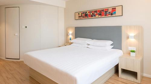 Imagen general del Hotel Hanting Wuxi Singapore Industrial Park. Foto 2