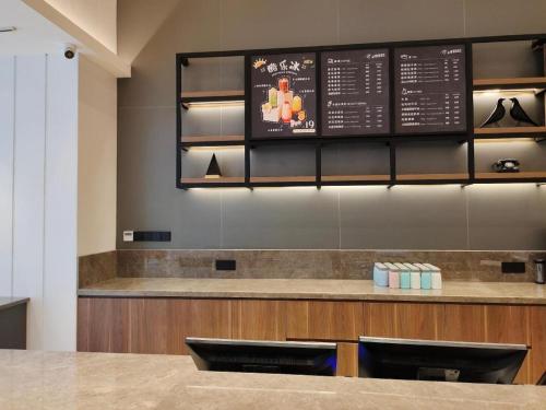 Imagen general del Hotel Hanting Yuyao Zhongan Plaza. Foto 10