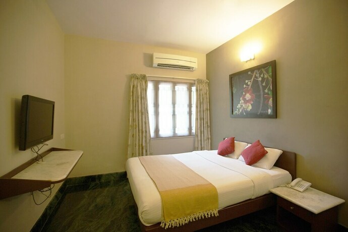 Imagen de la habitación del Hotel Hanu Reddy Residences Poes Garden. Foto 21