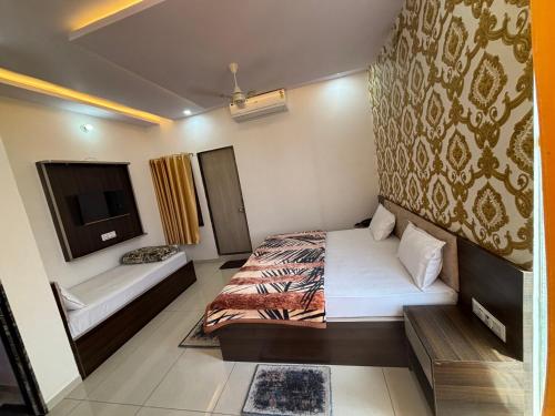 Imagen de la habitación del Hotel Hanuman Palace. Foto 19