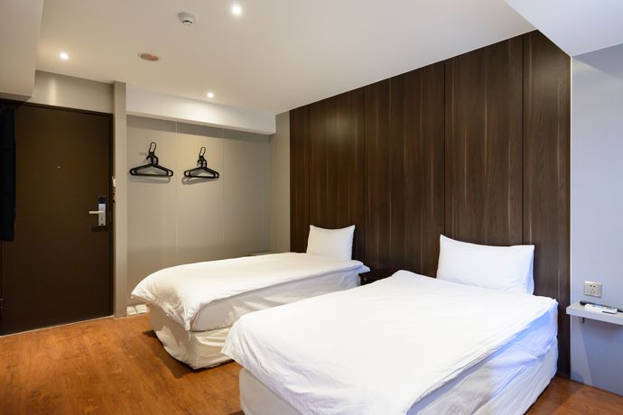 Imagen de la habitación del Hotel Hao Zhu Inn. Foto 3