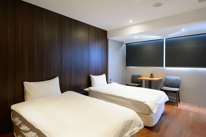 Imagen de la habitación del Hotel Hao Zhu Inn. Foto 5