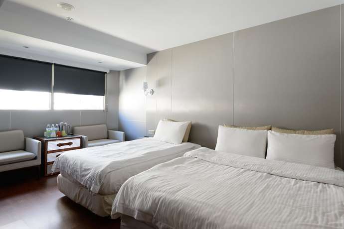 Imagen de la habitación del Hotel Hao Zhu Inn. Foto 10
