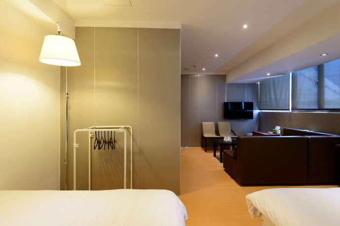 Imagen de la habitación del Hotel Hao Zhu Inn. Foto 13