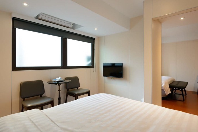 Imagen de la habitación del Hotel Hao Zhu Inn. Foto 14