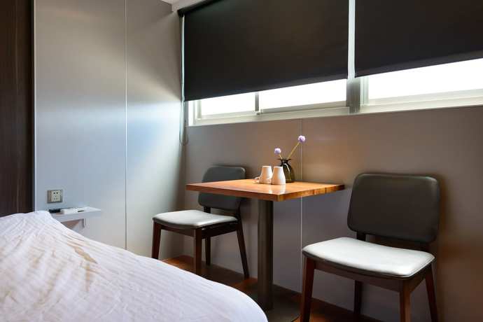 Imagen de la habitación del Hotel Hao Zhu Inn. Foto 16
