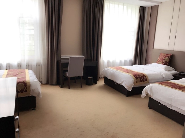 Imagen de la habitación del Hotel Haoge Hotel. Foto 3