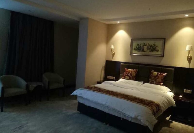 Imagen de la habitación del Hotel Haoge Hotel. Foto 4