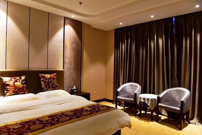 Imagen de la habitación del Hotel Haoge Hotel. Foto 5