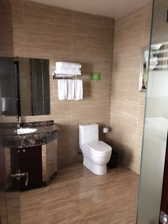 Imagen de la habitación del Hotel Haoge Hotel. Foto 6