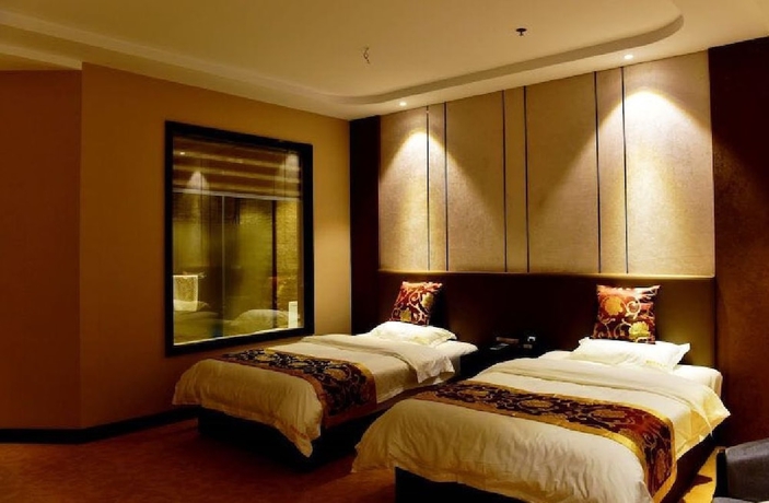 Imagen de la habitación del Hotel Haoge Hotel. Foto 7