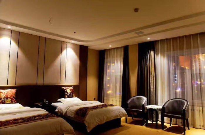 Imagen de la habitación del Hotel Haoge Hotel. Foto 8