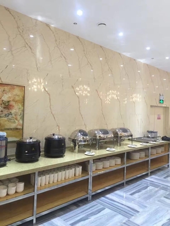 Imagen del bar/restaurante del Hotel Haoge Hotel. Foto 2