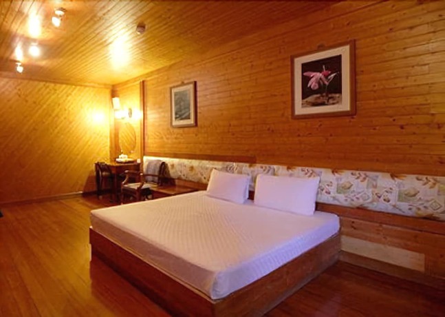 Imagen de la habitación del Hotel Haoshengdi. Foto 7