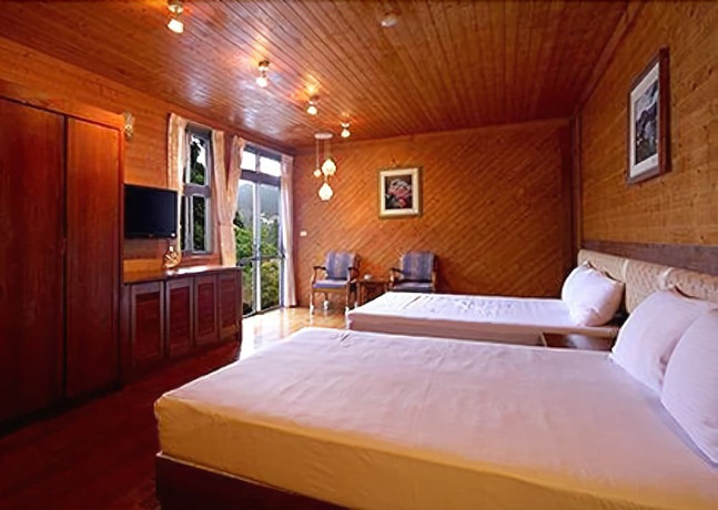Imagen de la habitación del Hotel Haoshengdi. Foto 16