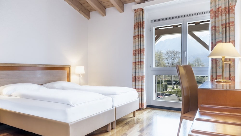 Imagen de la habitación del Hotel Hapimag Resort Ascona. Foto 9