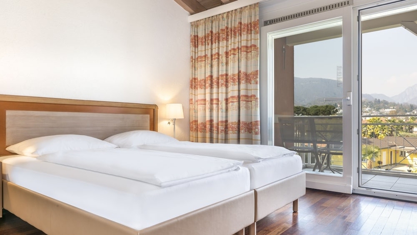 Imagen de la habitación del Hotel Hapimag Resort Ascona. Foto 13