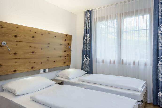 Imagen de la habitación del Hotel Hapimag Resort Flims. Foto 15