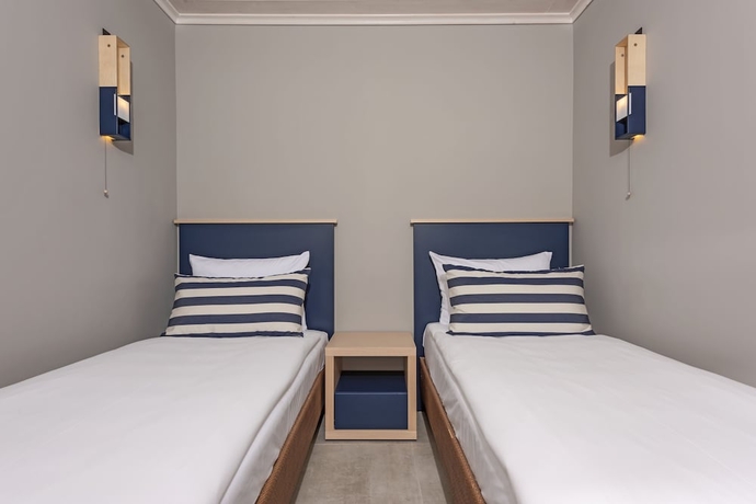 Imagen de la habitación del Hotel Hapimag Resort Porto Heli. Foto 10