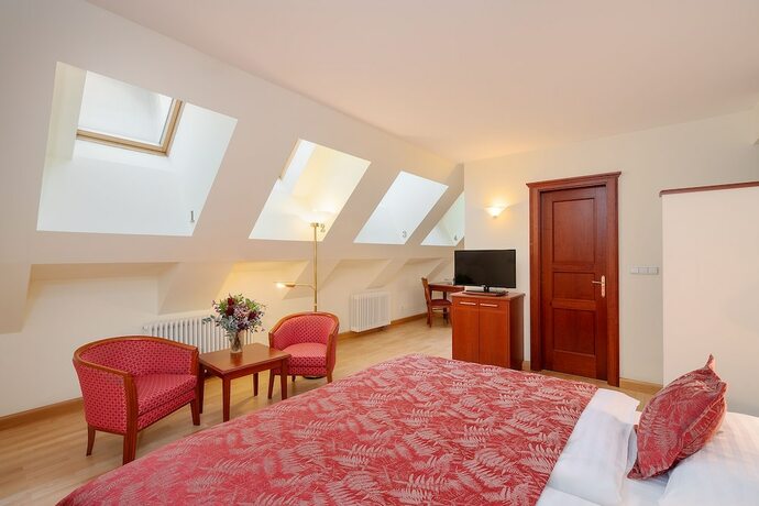 Imagen de la habitación del Hotel Hapimag Resort Prague. Foto 19