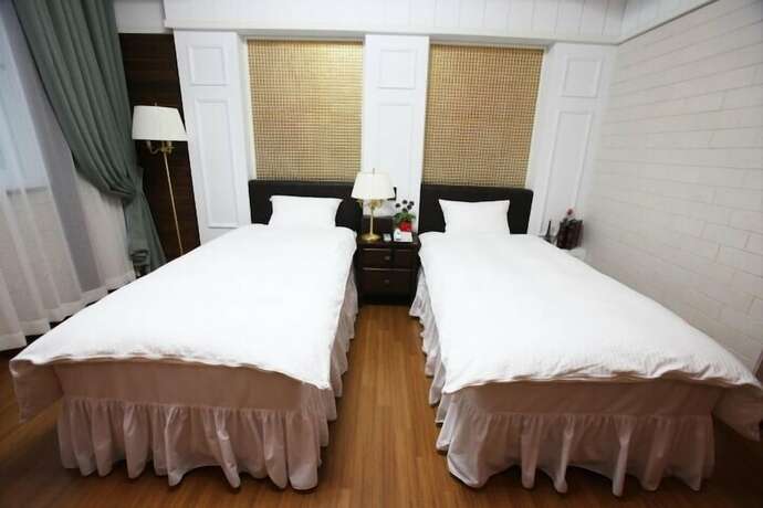 Imagen de la habitación del Hotel Happiness Cc. Foto 7