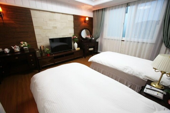 Imagen de la habitación del Hotel Happiness Cc. Foto 10