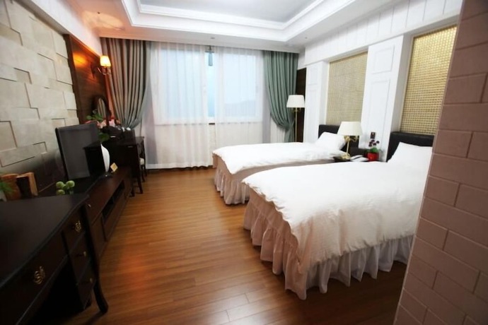 Imagen de la habitación del Hotel Happiness Cc. Foto 11