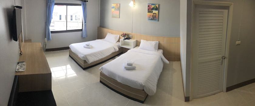 Imagen de la habitación del Hotel Happiness Garden Hotel. Foto 4