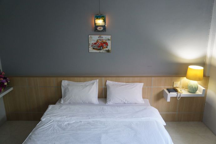 Imagen de la habitación del Hotel Happiness Garden Hotel. Foto 5