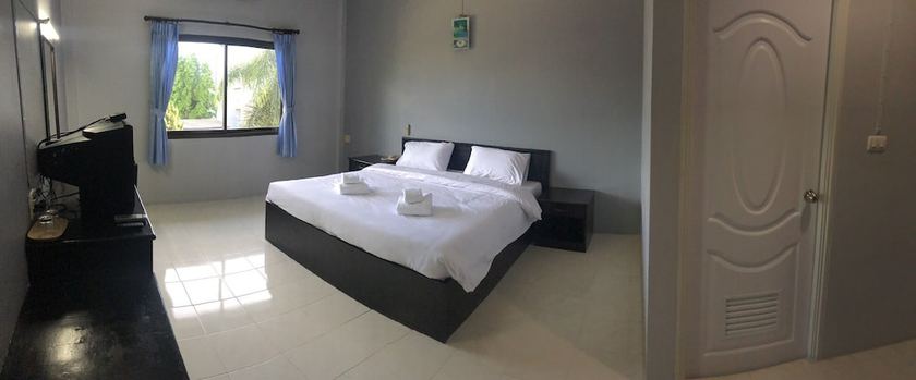 Imagen de la habitación del Hotel Happiness Garden Hotel. Foto 6