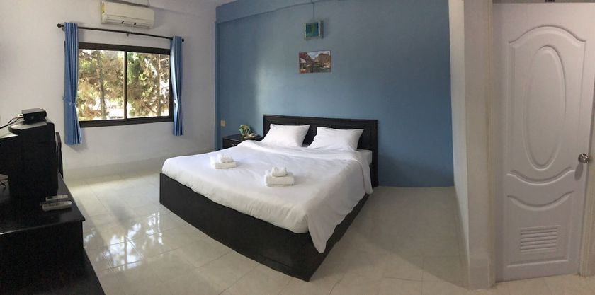 Imagen de la habitación del Hotel Happiness Garden Hotel. Foto 7