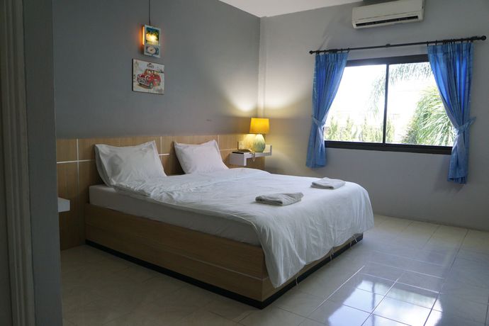 Imagen de la habitación del Hotel Happiness Garden Hotel. Foto 8