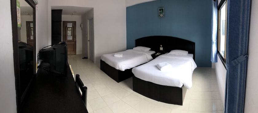 Imagen de la habitación del Hotel Happiness Garden Hotel. Foto 9