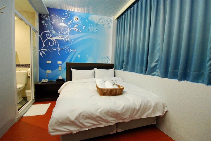 Imagen de la habitación del Hotel Happiness Inn. Foto 4