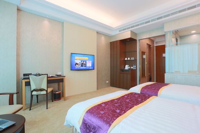 Imagen de la habitación del Hotel Happiness Inn Hotel, New Taipei City. Foto 2
