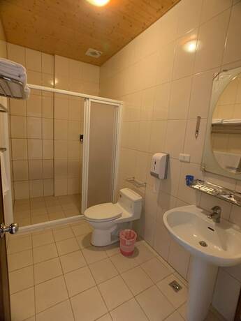 Imagen de la habitación del Hotel Happiness Road. Foto 13