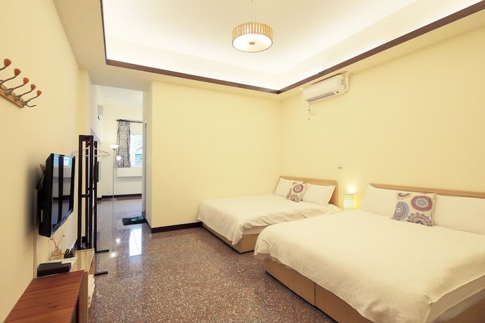 Imagen de la habitación del Hotel Happiness Yes Inn. Foto 10